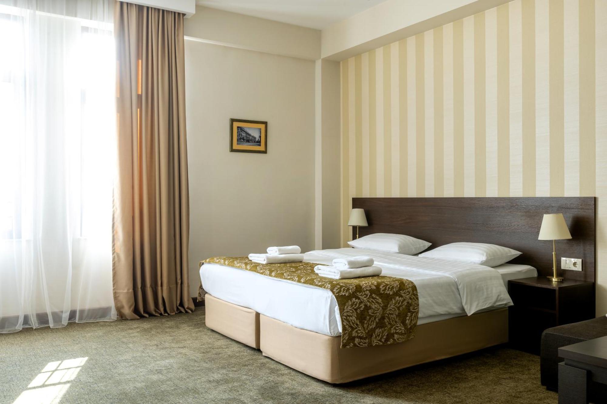 Citrus Hotel Тбилиси Стая снимка
